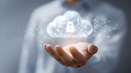 Poster - A person's hand holds a digital cloud security symbol.