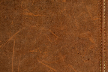 Poster - High-resolution image of brown leather texture with visible stitching. Perfect for backgrounds or design elements.