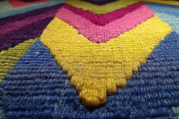 Aufkleber - Vibrant textile pattern showcasing colorful geometric shapes in a textile design studio