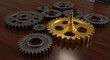 © DEGE - Cogwheels in Various Sizes and Colors Interlocked on a Wooden Surface Creating Industrial Mechanism and Geometric Design