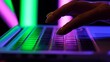 © kinomaster - Close Up of Fingers Typing on a Colorful Laptop Keyboard