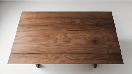 Empty wooden table set against white background for display or product use