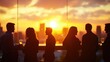 © Shelley - Silhouetted business people networking at a rooftop bar during sunset, city skyline view, corporate event atmosphere, wide angle, copy space.