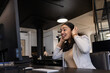© WavebreakMediaMicro - Businesswoman in office smiling while using headset for video conference call