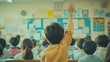 © Basileus - Child raising hand in a classroom setting.