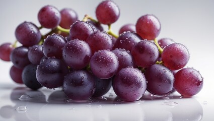 Poster - Isolated red grapes covered in water droplets on a white surface