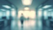 © Rizvan - Spacious hospital hall with blurred interior, bright lighting, and abstract patterns