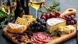 © pupus - A lovely arrangement of wine cheese fruits and meats