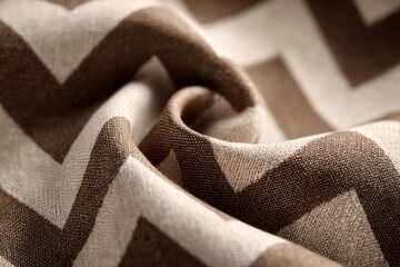 Poster - A close-up shot showcasing the intricate details of a brown and beige zigzag patterned fabric, revealing its soft texture and elegant design for interior decoration.