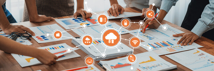 Fototapete - Analyst team utilizing BI Fintech to analyze and pointing at financial dashboard paper office. Businesspeople examining report paper on table for business insight. Panorama shot. Scrutinize Amity