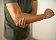 © kieferpix - Man having elbow pain soreness from injury