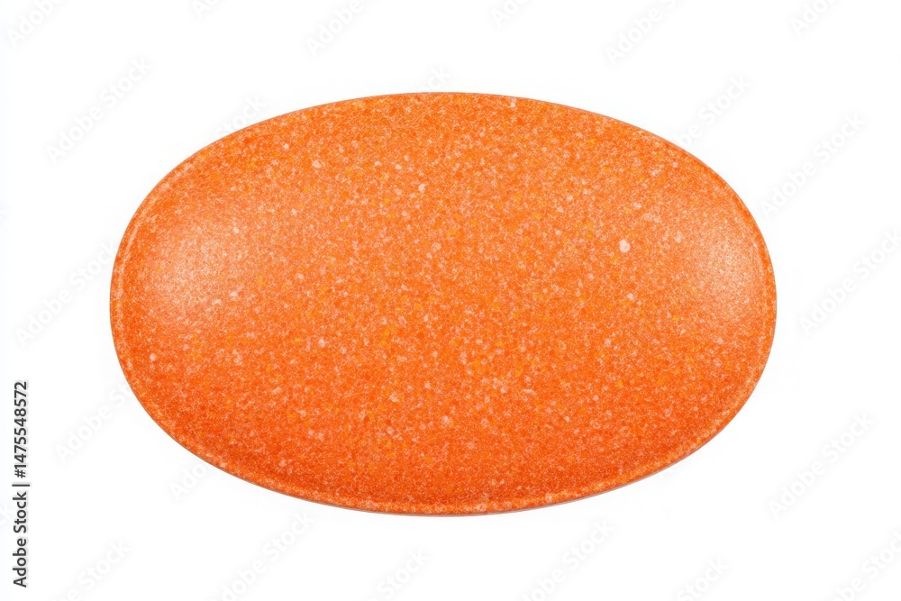 A smooth, bright orange tablet is centered on a white background. Its oval shape and glossy surface catch the light, highlighting its uniform color and texture.