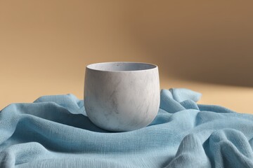 Poster - Light gray, rounded bowl on a light teal cloth surface.