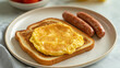 © mamah - Breakfast plate with toast and eggs and sausage