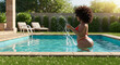 © Aline Shawn - Curvy black woman in a swimming pool, splashing water. She is wearing a red swimsuit bikini and has a beautiful afro hair. The background includes green grass and lush bushes, soft bokeh focus.