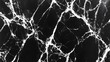 © kirania - Striking black and white marble surface texture pattern.
