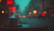 © Swaha - A steaming mug of coffee sits on a table, bathed in the soft glow of a city night.  The blurred city lights create a dreamy, atmospheric backdrop.