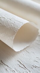 Poster - Close up of textured paper roll in studio light showing detail and depth of material for backgrounds and design elements