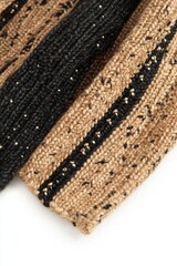 Poster - Close-up of Knitted Wool Fabric in Beige and Black with Gold Beads on White Background Studio Shot