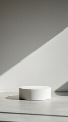 Poster - Minimalist Cylinder Podium in White Room with Sunlight, Low Angle Product Display, Studio Shot, Modern Style