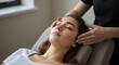 © singgih - Woman Receives Head Massage