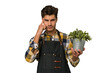 © Asier - Young caucasian gardener man isolated on white background pointing temple with finger, thinking, focused on a task.