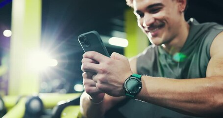 Poster - Fitness, gym and man relax with phone for exercise schedule, track health and reading online. Mobile, break and happy bodybuilder in club for wellness app, training progress and typing text message