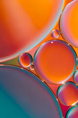 Wall Mural - Abstract 3D geometric iridescent holographic background with metal chrome surface with multicolored sheen, vibrant orange, blue, red, turquoise, green shade, reflective glass shape with colored stains