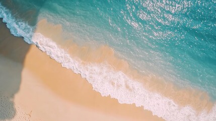  Aerial View of Turquoise Ocean Waves Crashing on a Sandy Beach