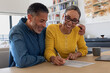 © ReeldealHD images - Couple joyfully signing a contract together