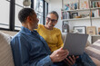 © ReeldealHD images - Warm Smiles Shared By Couple Working On Laptop
