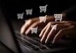 © AndiAzis - Hands typing on laptop with shopping carts