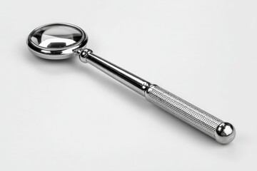 Aufkleber - Magnifying glass placed on a clean surface reflecting light in a well-lit room