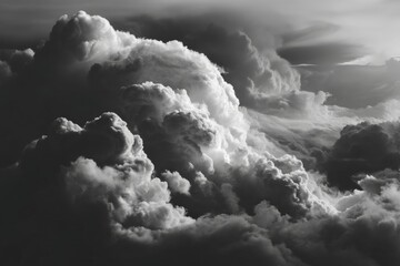 Poster - Dramatic clouds create an evocative black and white sky at sunset revealing nature's beauty and wonder