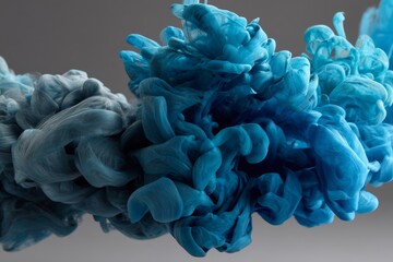 Aufkleber - Colorful swirls of blue and teal ink mixing in water create a mesmerizing abstract design