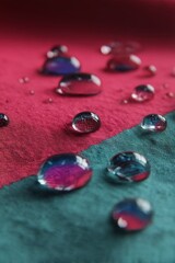 Poster - Water drops on fabric close up macro photography showing texture and color contrast with shallow depth of field and artistic composition