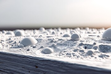 Poster - Close-up view of water droplets on a textured surface during sunset with soft lighting enhancing details