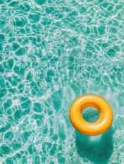 Poster - Overhead view of yellow inflatable tube floating in turquoise swimming pool water with light reflections summer vacation concept