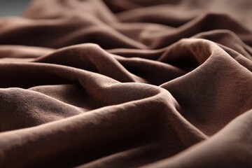 Leinwandbilder - Textured fabric folds create an elegant and warm atmosphere in a soft brown hue, ideal for interior design projects or textile showcases