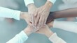 © Paul - Diverse Multiethnic Group Hands Stacked Showing Unity and Cooperation