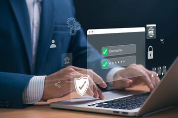 Leinwandbilder - Cybersecurity Concept Showing Businessman Logging In on Laptop with Username and Password Interface. Online Identity Protection, Secure Access, and Privacy in Corporate Environment