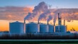 © affa_dreams - Industrial storage tanks releasing vapor under a colorful sunset sky with dramatic clouds, depicting the contrast between nature and pollution in an industrial setting