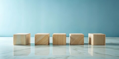 Leinwandbilder - Clean Minimalist Wooden Cubes on Polished Surface Against a Light Blue Wall