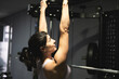 © FotoAndalucia - woman training exercises in gym alone