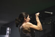 © FotoAndalucia - woman training exercises in gym alone