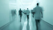 © VINA - Blurred Motion of People Walking in a Hospital Corridor