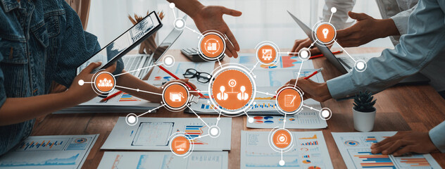 Fototapete - Engaging business meeting scene showcasing collaboration and data analysis. Digital tools enhance productivity as professionals interact and strategize for success. Amity