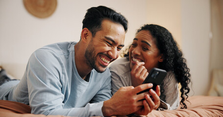 Aufkleber - happy couple, relax or laughing with phone on bed for online entertainment, humor or comedy at home.
