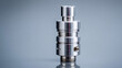 © Aris Suwanmalee - Close-up view of a metallic vaping device on a smooth background.