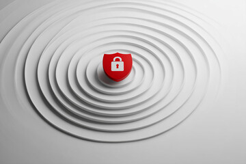Poster - Red shield with lock icon on white concentric circles platform, symbolizing security, protection, and data safety, ideal for digital security concepts